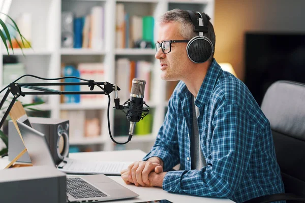 Smiling Man Wearing Headphones Recording Audio Podcast Using Professional Microphone — Foto de Stock