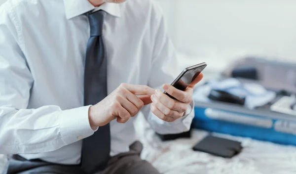 Businessman Traveling Work Using His Smartphone Hotel Room Searching Online — Stok fotoğraf