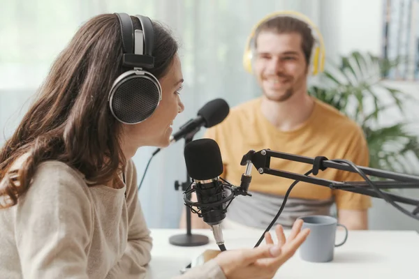 Young Man Woman Wearing Headphones Doing Live Podcast Channel Communication — ストック写真