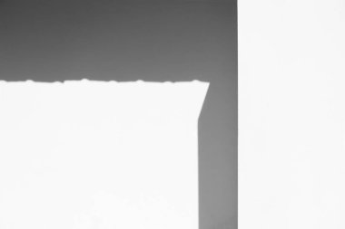 shadow and light on cement white wall part of architecture background 