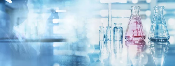 scientist with mask shadow with glass flask and beaker in medical health science of blue technology banner background