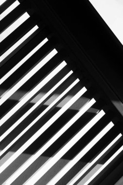 light and shadow of on cement wall black and white abstract architecture line geometric background