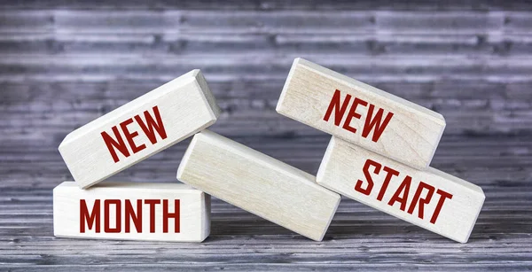 Text New Month New Start Auf Holzblöcken Ansicht Der Tischplatte — Stockfoto