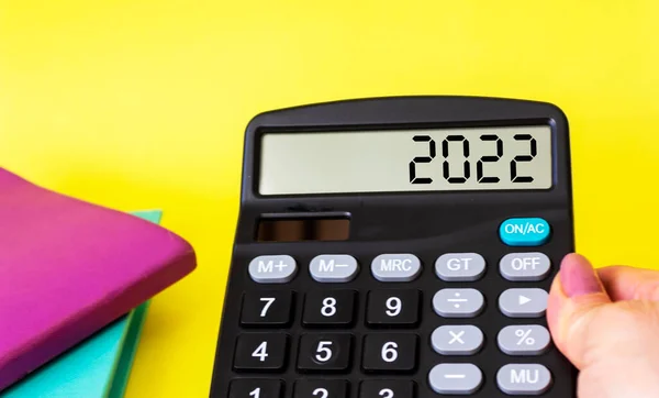 Female Hand Holds Calculator Display Number 2022 Business Tax Tax — Fotografia de Stock