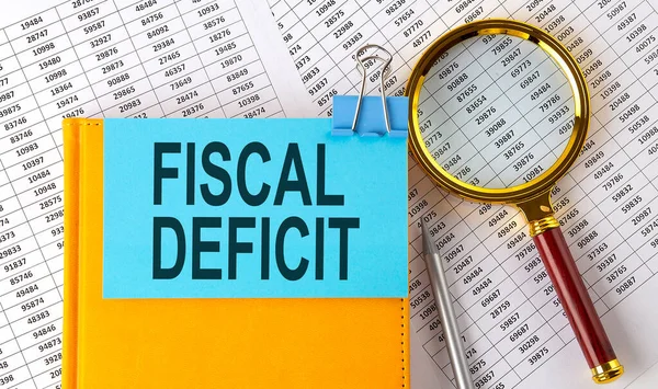 Fiscal Deficit Testo Adesivo Taccuino Con Lente Ingrandimento Grafico Affari — Foto Stock