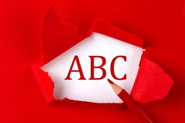Texto Abc Sobre Papel Rojo Roto Con Lápiz Rojo — Foto de Stock