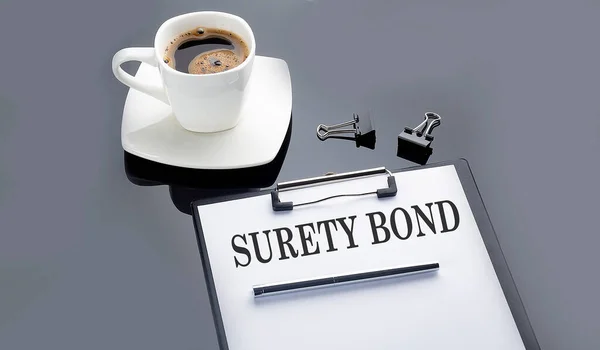 Surety Bond Text Paper Sheet Coffee Black Background — Stock Photo, Image