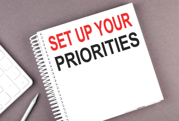 Set Your Priorities Text Notebook Calculator Pen — Stock Photo, Image