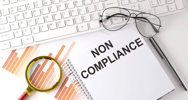 Non Compliance Text Written Notebook Keyboard Chart Glasses — Stock Photo, Image