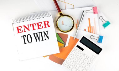 Beyaz not defteri ENTER to WIN beyaz arkaplan üzerinde şema, grafik, hesap makinesi ile kazanmak