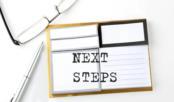 Next Steps Text Sticky Notes Glasses Pen Business Concept — Stockfoto