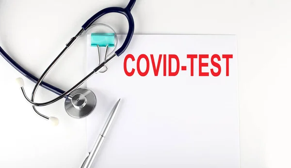 Covid Test Tekst Geschreven Het Papier Met Stethoscoop Medisch Concept — Stockfoto