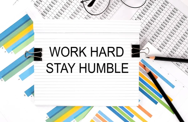 Notebook Pencils Glasses Graph Background Text Work Hard Stay Humble — Stockfoto