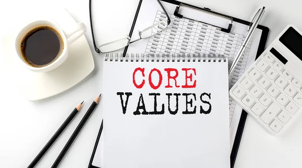 Core Values Text Paper Calculator Notepad Coffee Pen Graph — 图库照片