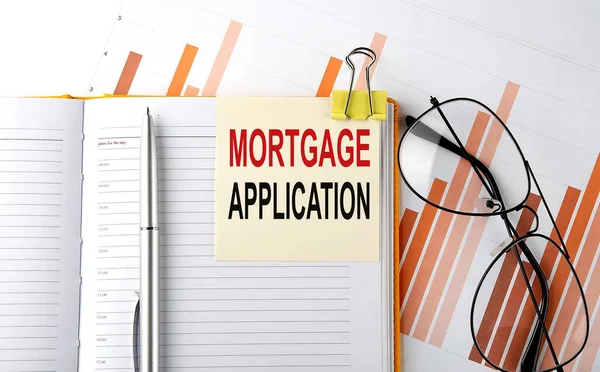 Αιτηση Κειμενου Mortgage Στο Αυτοκόλλητο Στο Σημειωματάριο Στο Φόντο Του — Φωτογραφία Αρχείου