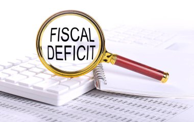 Klavyedeki büyüteçle FISCAL DEFICIT sözcüğü