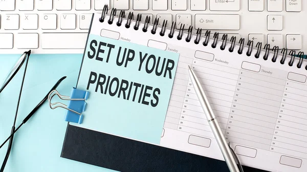 Set Your Priorities Text Blue Sticker Planning Keyboard Blue Background — Stock Photo, Image