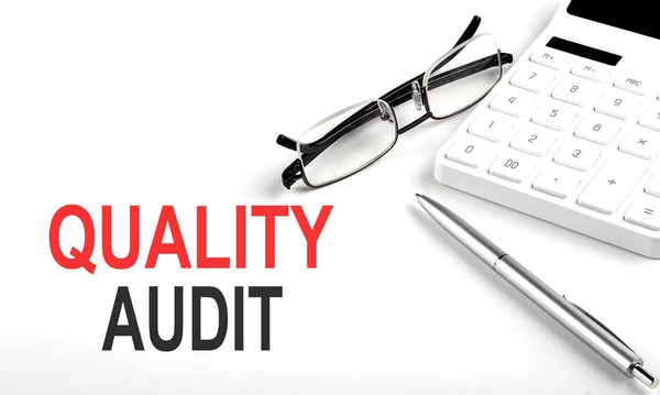 Quality Audit Concept Calculator Pen Glasses White Background — Stock Photo, Image