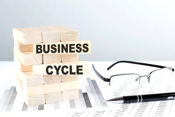 Business Cycle Written Wooden Blocks Chart Background — Stock Photo, Image