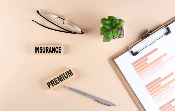 Insurance Premium Text Wooden Block Chart Glasses Business Concept — Stock Photo, Image