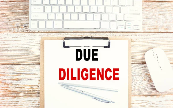 Due Diligence Text Clipboard Keyboard Wooden Background — Stock Photo, Image