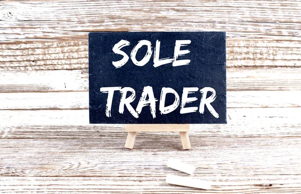 Sole Trader Text Auf Miniaturtafel Auf Holzgrund — Stockfoto