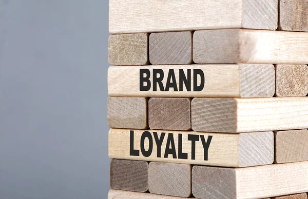 The text on wooden blocks BRAND LOYALTY