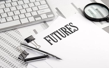 Grafikli ve klavyeli bir kağıt üzerinde FUTURES metin, iş konsepti
