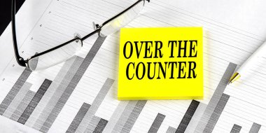 Grafik arka planında sarı yapışkan maddeyle ilgili bir kelime var.