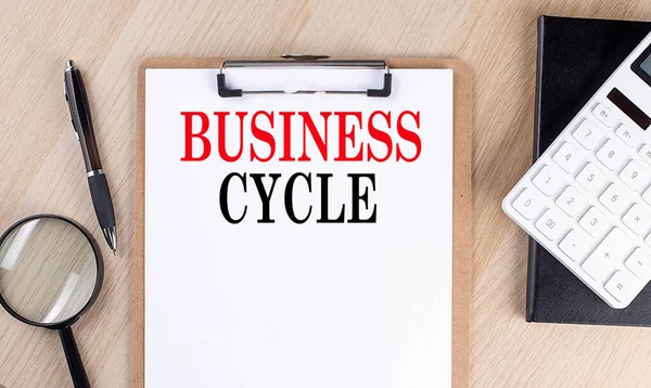 Business Cycle Text Clipboard Wooden Background — Stock Photo, Image