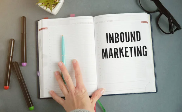Notebook with Tools and Notes About Inbound Marketing