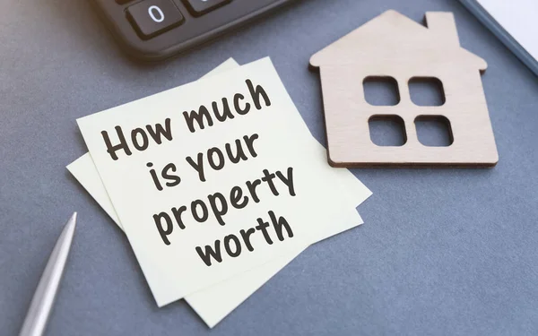 How Much Your Property Worth Text Tablet Device Wood — Stock Photo, Image