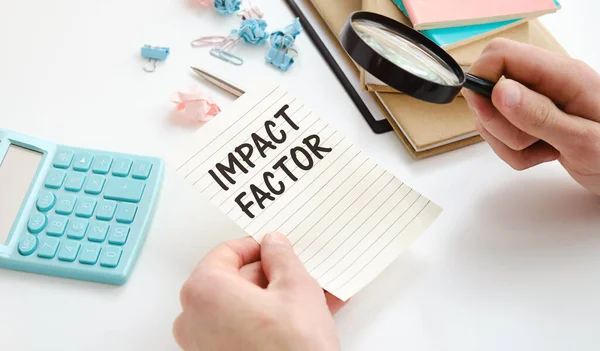 Closeup Businessman Holding Card Text Impact Factor Business Concept Image — Stockfoto