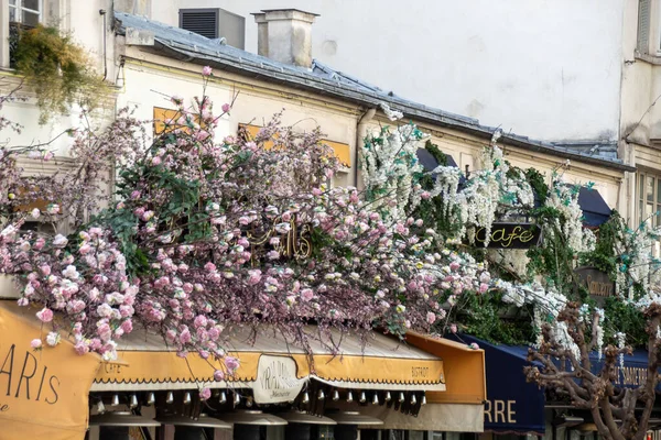 flowers on the front of a restaurant