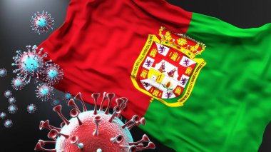 Granada ve Covid salgını. Virüs, Granada 'nın bayrağına saldırıyor. Virüs salgınıyla mücadele sembolü olarak.