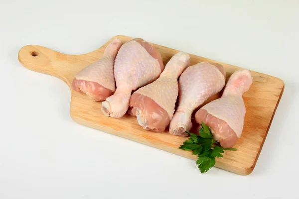 Fresh Chicken Drumsticks Wooden Board Isolated White Group Raw Chicken — Stock Photo, Image