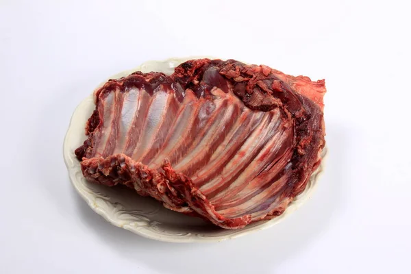 Raw Deer Ribs White Plate White Background Meat Wild Animals — Stock fotografie