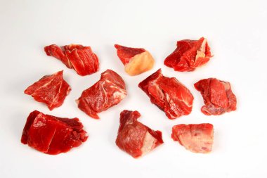 Fresh raw beef meat isolated on white background. Set of raw meat pieces