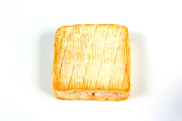 Μια Πλατεία Του Roussot Τυρί Λευκό Φόντο Roussot Είναι Ένα — Φωτογραφία Αρχείου