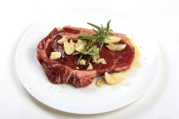 Raw Sirloin Beef Steak Rosemary Pepper Salt Garlic White Background — Stok fotoğraf