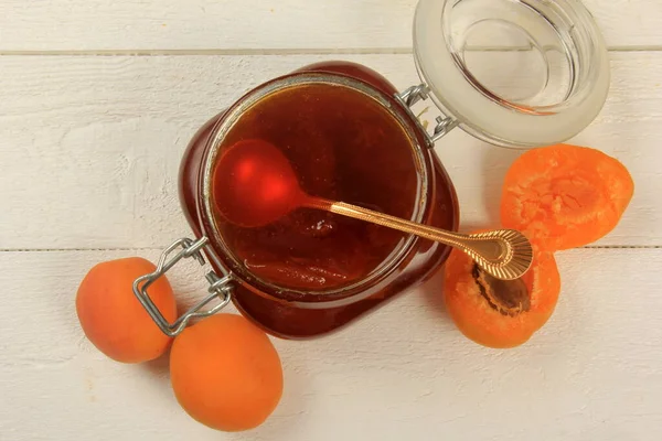 Apricot Jam Glass Jar Fresh Apricots Light Wooden Background — Zdjęcie stockowe