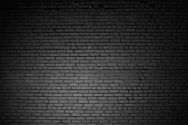 Старая Кирпичная Стена Темными Выветривающимися Камнями — стоковое фото