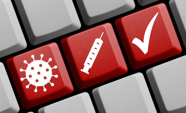 コロナウイルスの予防接種 ウイルス 注射器 コンピュータキーボードのチェックマーク — ストック写真