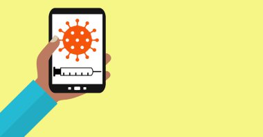 Renkli telefon sahibi kişi: Aşı kavramı