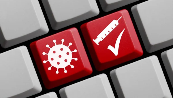 コロナウイルスワクチンオンライン 注射器とCovid 19アイコンのシンボルを持つ赤いキーボード — ストック写真