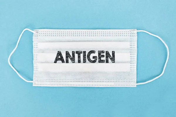 Медицинская Маска Antigen Текстом Синем Фоне — стоковое фото