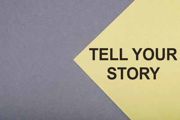 Tell Your Story Text Gray Yellow Background — Stockfoto