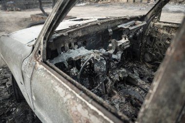 Interior of Burnt car because of Forest Fire - Bushfire Crisis and Global Collapse