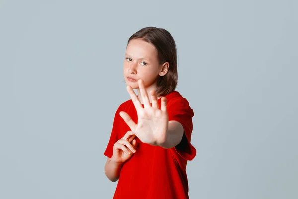 Serious Brunette Teen Girl Stretch Out Hand Showing Stop Sign — Stock Photo, Image