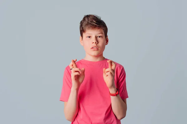 Portrait Hopeful Handsome Teenager Boy Cross Fingers Good Luck Awaiting — Stock Photo, Image